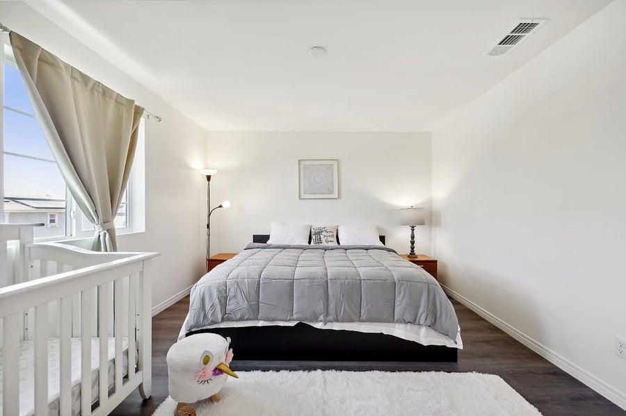 Sleep in luxury! This spacious bedroom features a king-size bed for the ultimate comfort and relaxation.