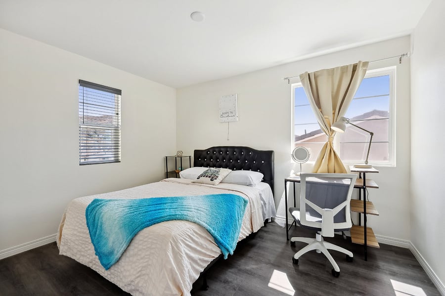 Bright and inviting, this bedroom bath is filled with natural light.