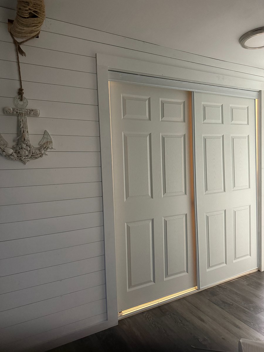 Sliding doors that covers Bathroom/Laundry Room.