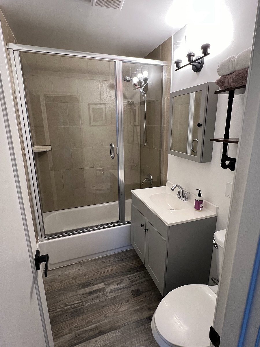 Remodeled bathroom with beautiful glass shower doors