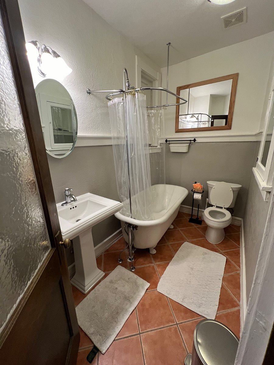 Bathroom with huge clawfoot tub and update shower/sink features!