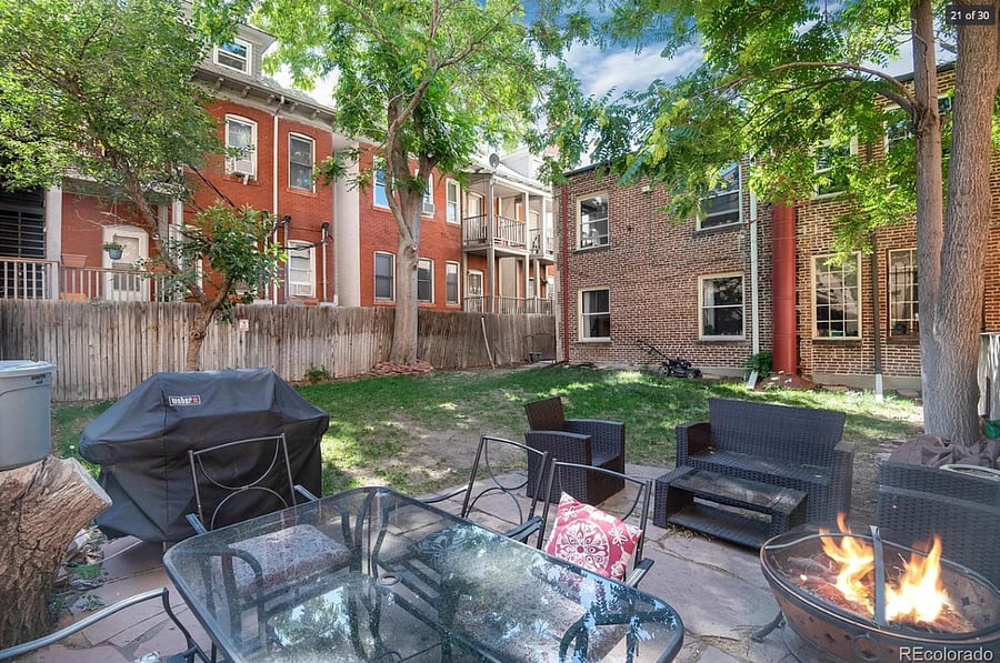 Building has private backyard accessible from the unit (you are in the top two windows shown in brick building on right).