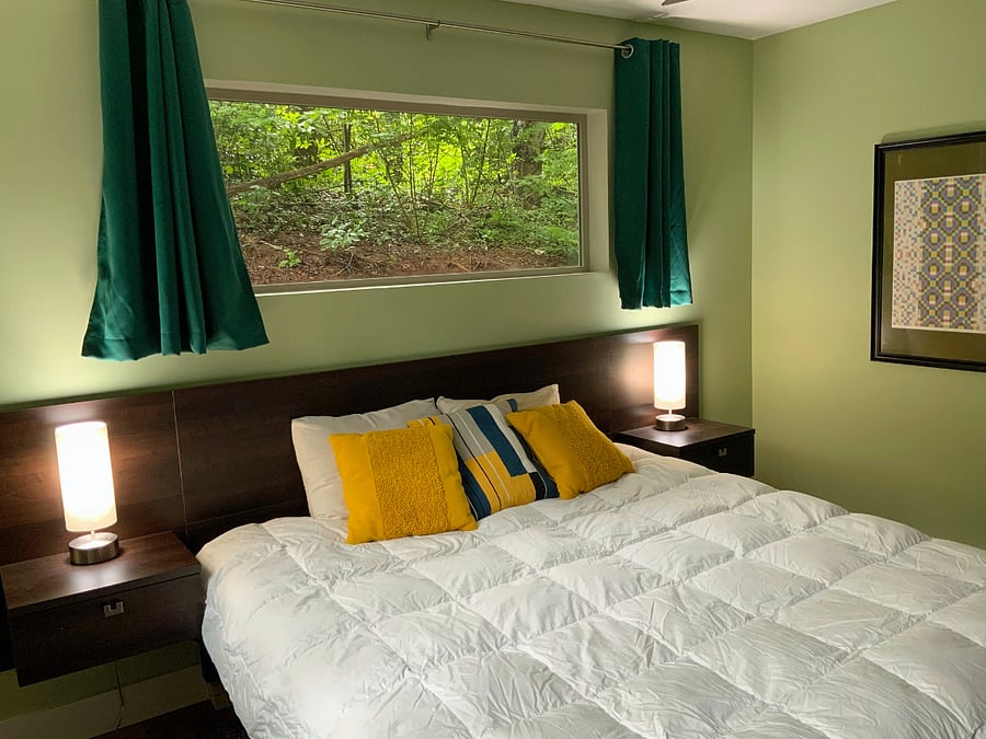Master bedroom has king-size bed