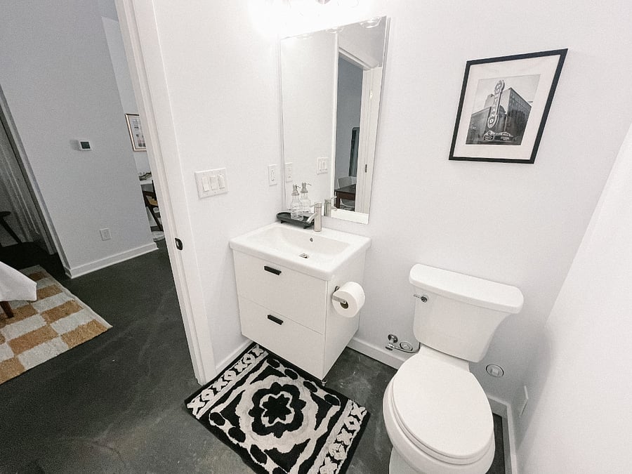 Updated modern bathroom with full bath/shower combo.