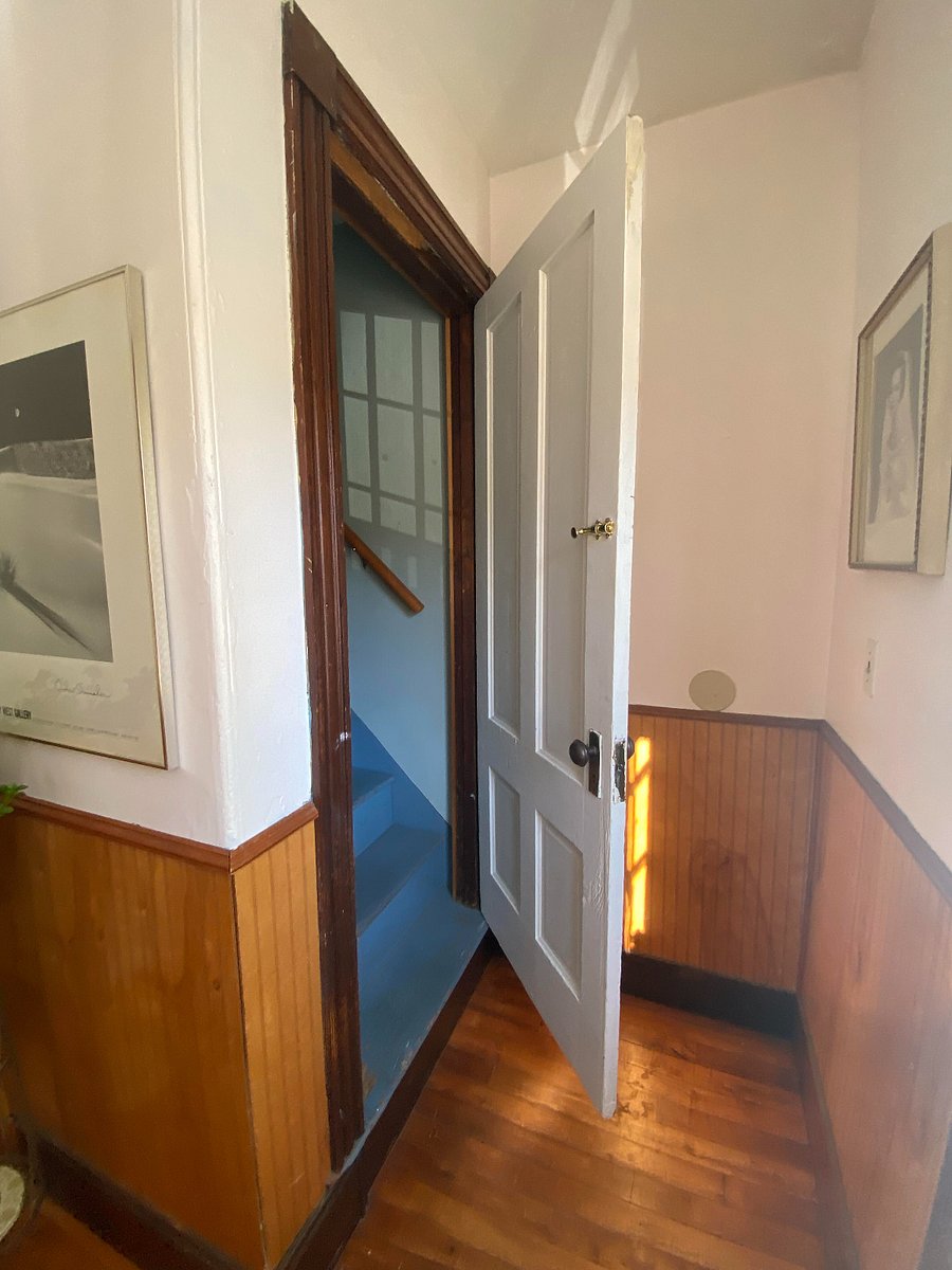 Stairwell entrance to studio efficiency, located off of the shared kitchen.
