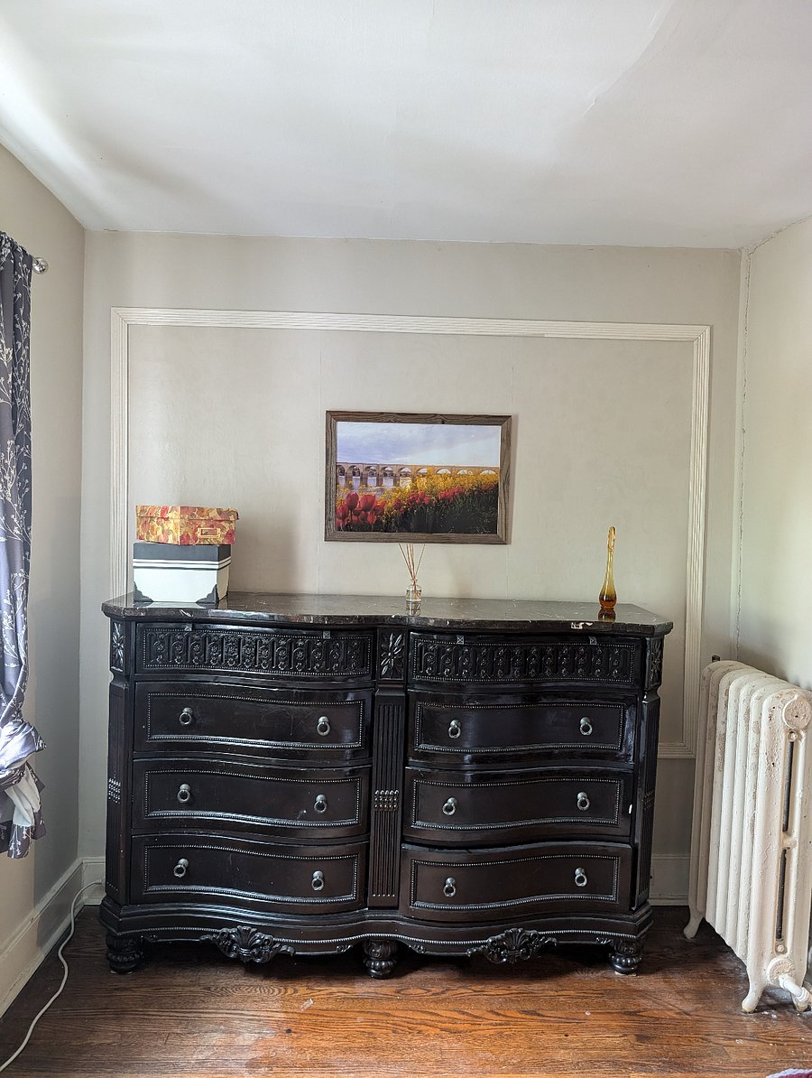 Large dresser in bedroom
