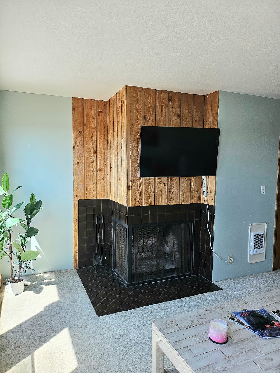 Living room includes mounted smart TV. Enjoy your favorite shows while taking in the beautiful view right from the comfort of the couch!