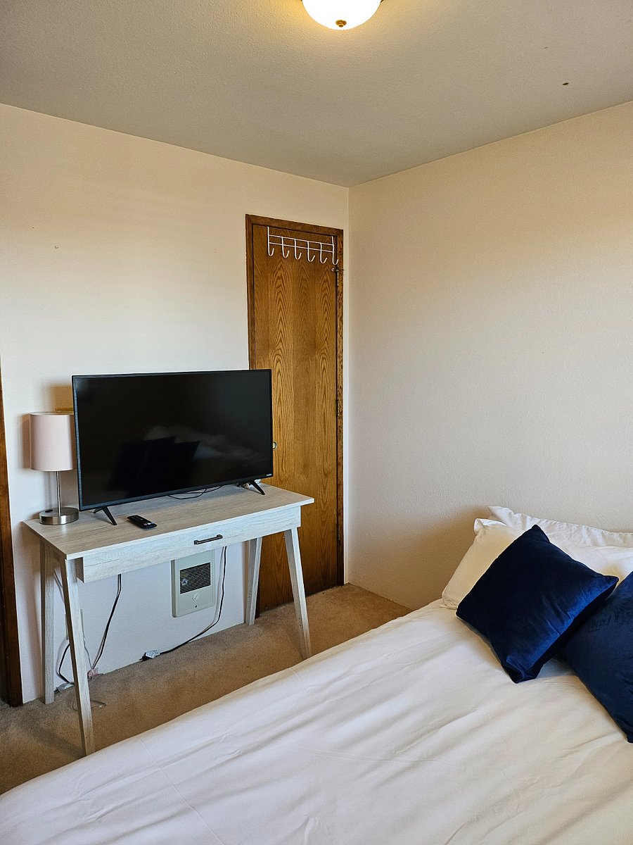 Bedroom 2 has closet and smart TV.
