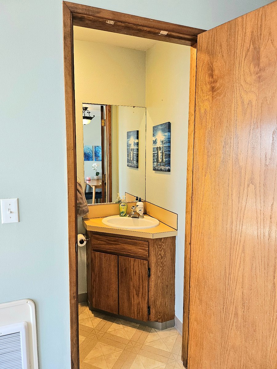 Upstairs half bath.