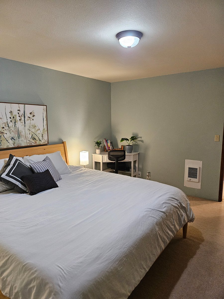 Bedroom 1 also includes workspace desk.