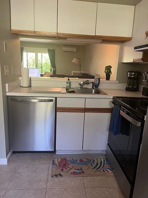 Kitchen looks into family room.