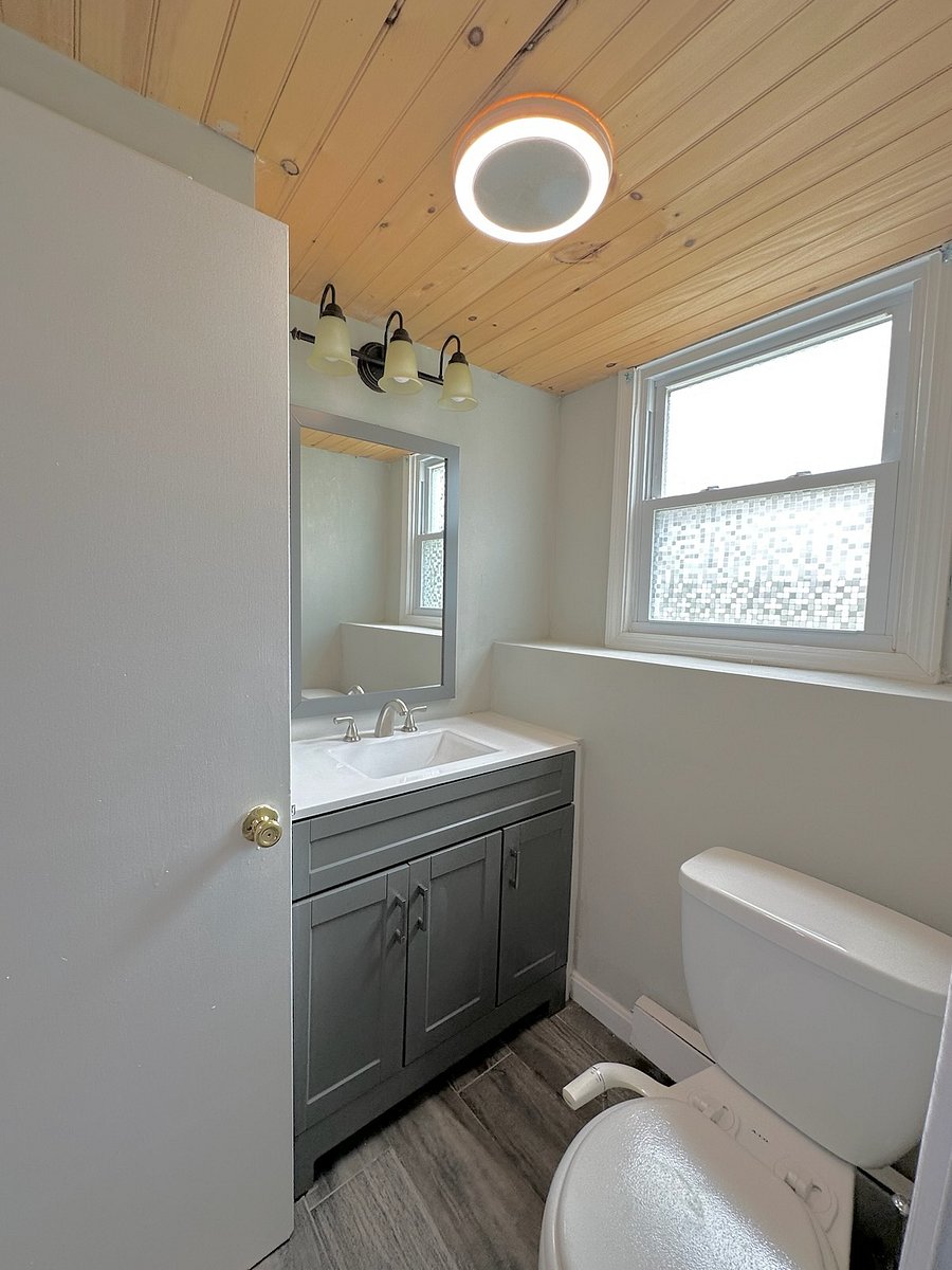 Full restroom with standing shower