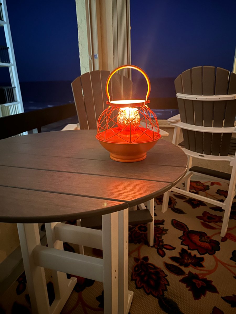 The balcony overlooking the ocean and beach is a great spot for morning coffee or evening relaxation.