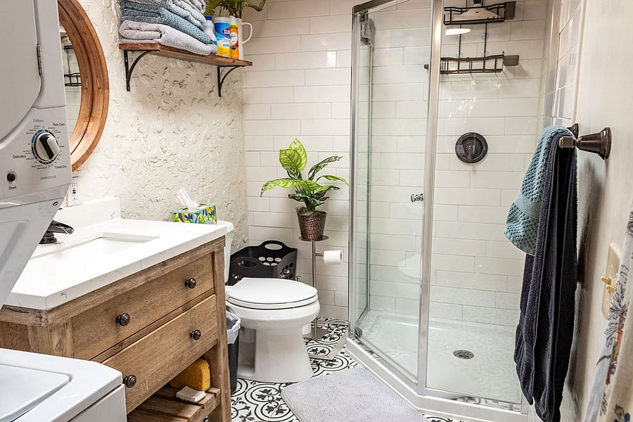 Bathroom with full shower.