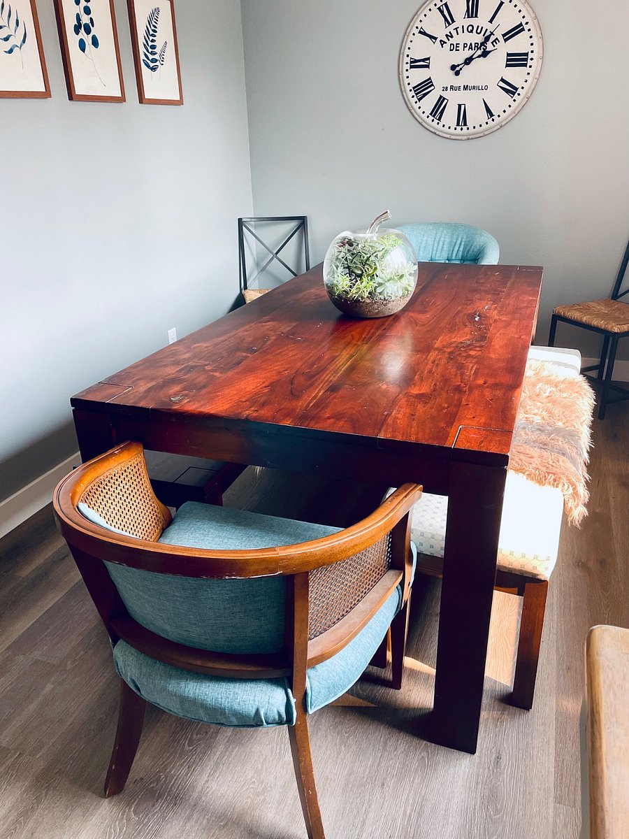 Dining room with seating for 10.
Family meals + games night are special around this table.
