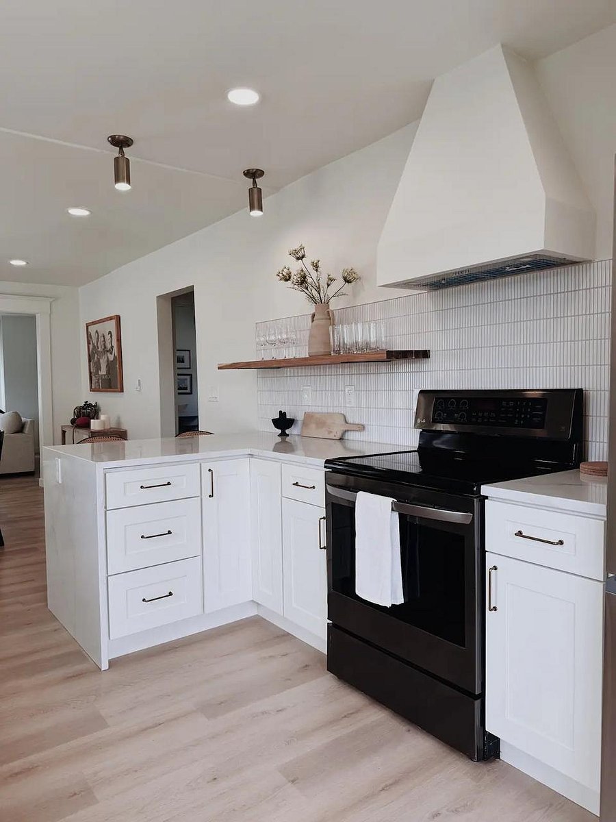 Bright, modern kitchen with stainless steel appliances and plenty of counter space.
