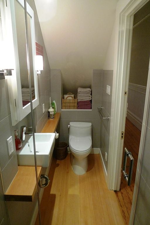 Bathroom in the front of the house. Rain shower and toilet