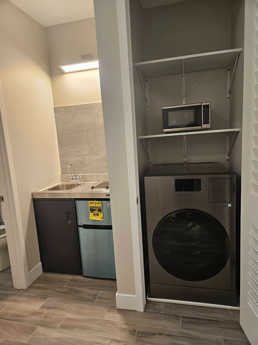Kicthnette, 2 burner stove, sink & refrigerator, waher & dryer combo, microwave
