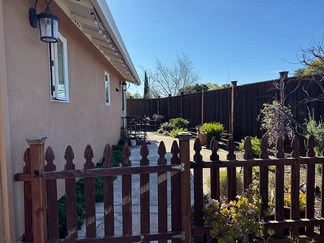 Gate separating main yard.