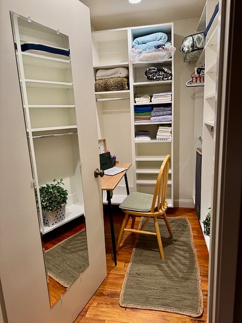 Workspace with enclosed door and skylight.