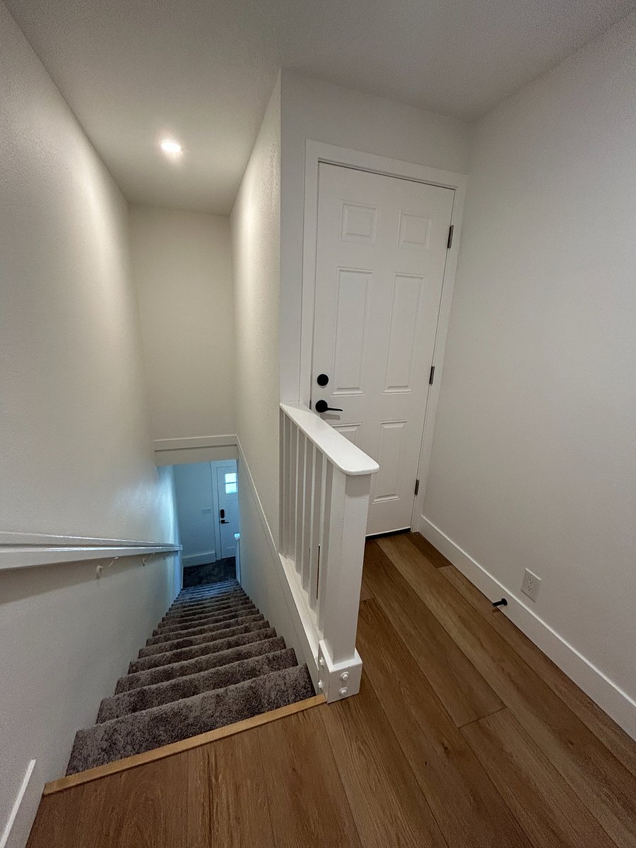 Apartment entrance at the top of the stairs