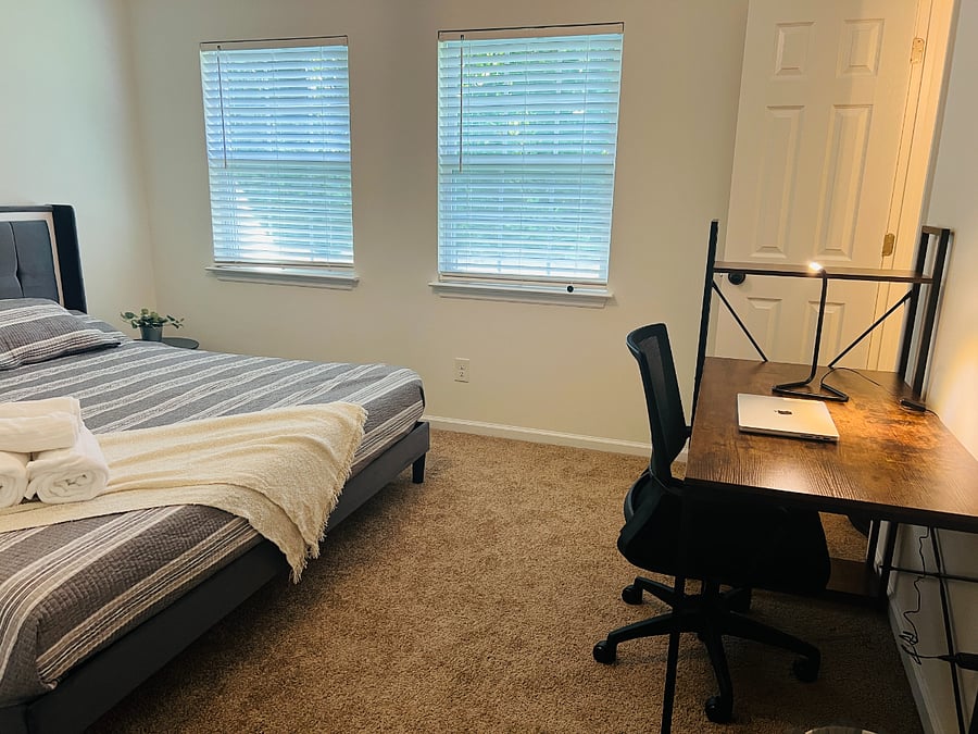 Master bedroom with attached bathroom.