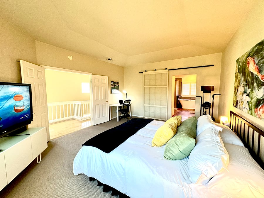 ONLY AVAILABLE WITH FULL HOME RENTAL - Cal King Master BR with Ensuite Bathroom, 50" TV, Exercise Bike, Desk, chair