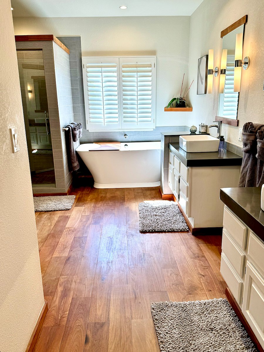 ONLY AVAILABLE WITH FULL HOME RENTAL - CalKing Master BR Bathroom with double sinks, designer tub, shower, separate toilet room, walk-in closet.