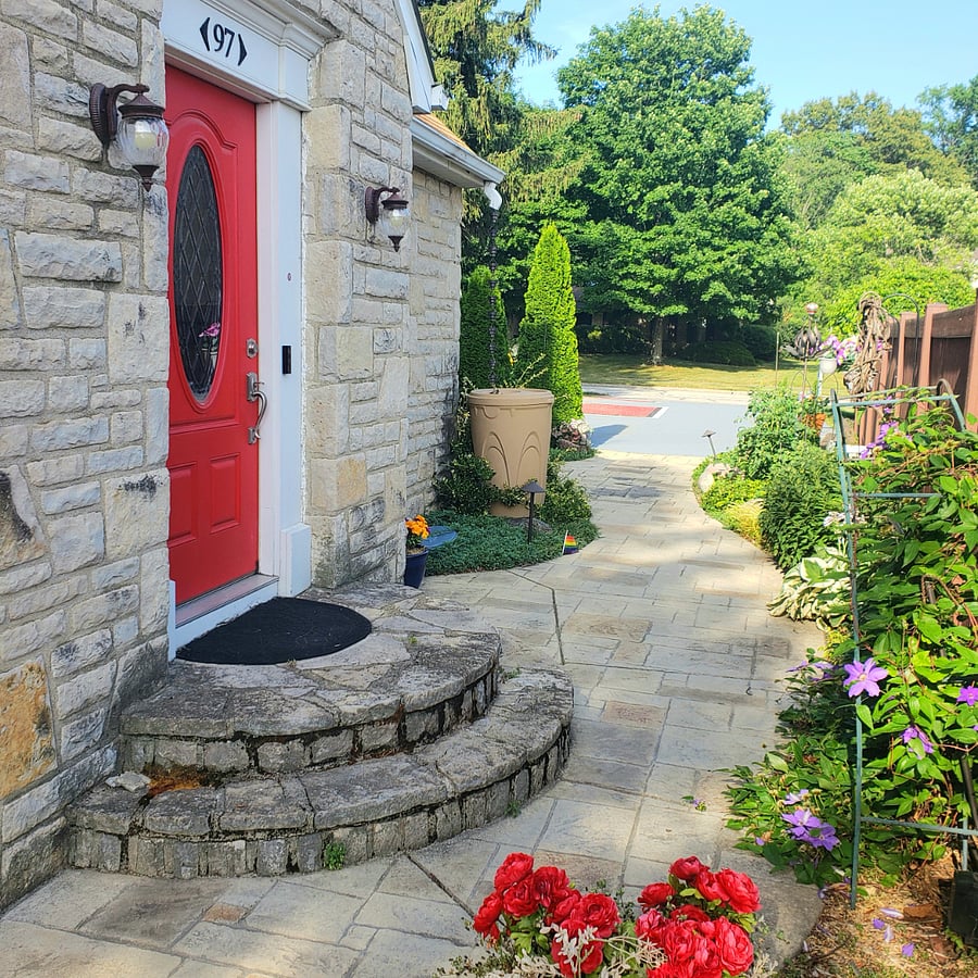 Our red front door is the preferred entrance, but tenants may also use the breezeway side door entrance.  