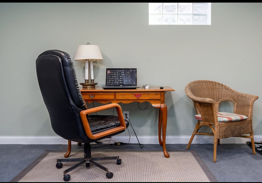 Our listing room comes with a work desk, bankers lamp, executive chair, fast Wi-Fi and a 55" Sony TV.