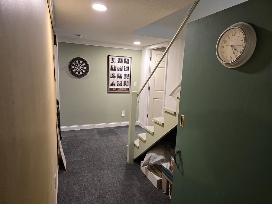 The rented room connects to the shower/tub unit with a short hallway. This showe/tub unit is dedicated to the basement room. It's shared by necessity because it's next to the washer and dryer, which we all use. The room is made private by shutting and locking the door so no one else can access the space if schedules collide. 