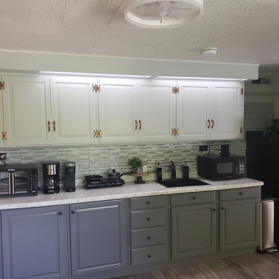 Well stocked kitchen with full fridge, towels, trash bags, first aid kit, fire extinguisher, and dish soap and hand soap provided