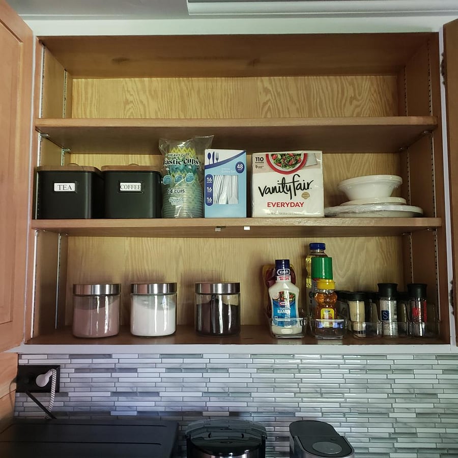 Pantry comes stocked with paper products, coffee, tea, hot chocolate, condiments, and spices.