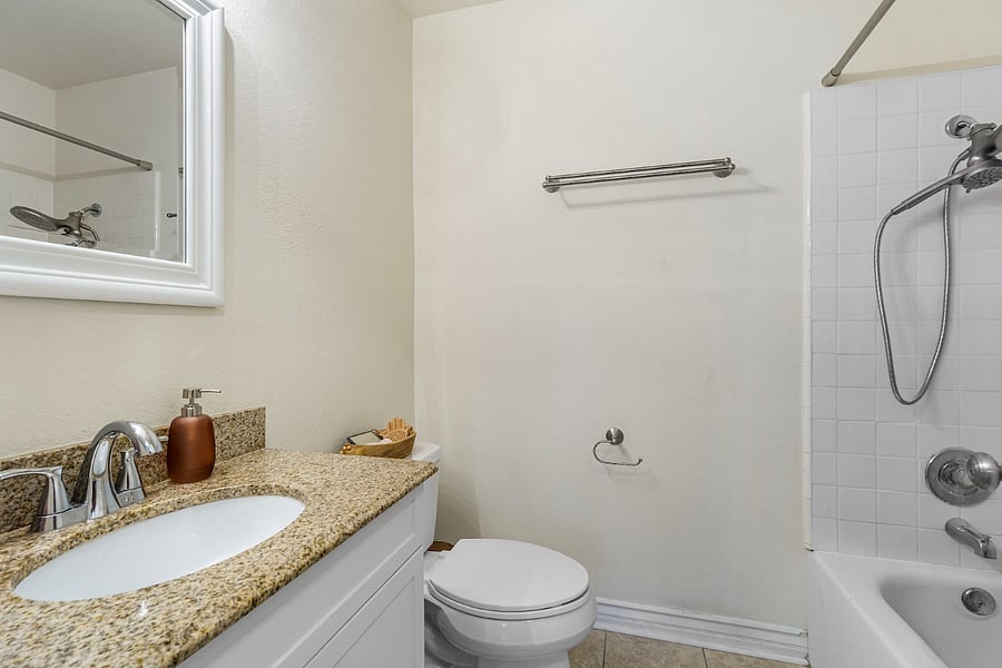 Bathroom with bathtub.