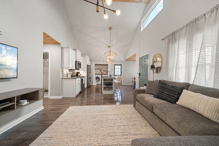 Open Living Space with Smart TV and Beautiful Vaulted ceilings.
