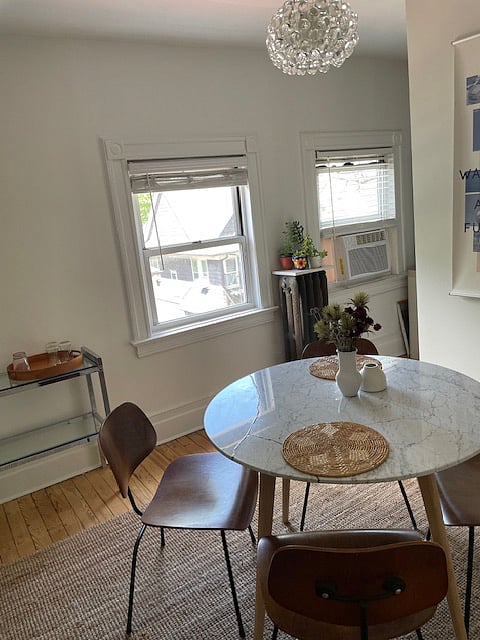 Dining area looks out to backyard and neighborhood