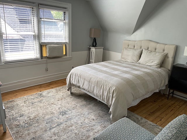 Very comfortable Queen bed and window A/C unit