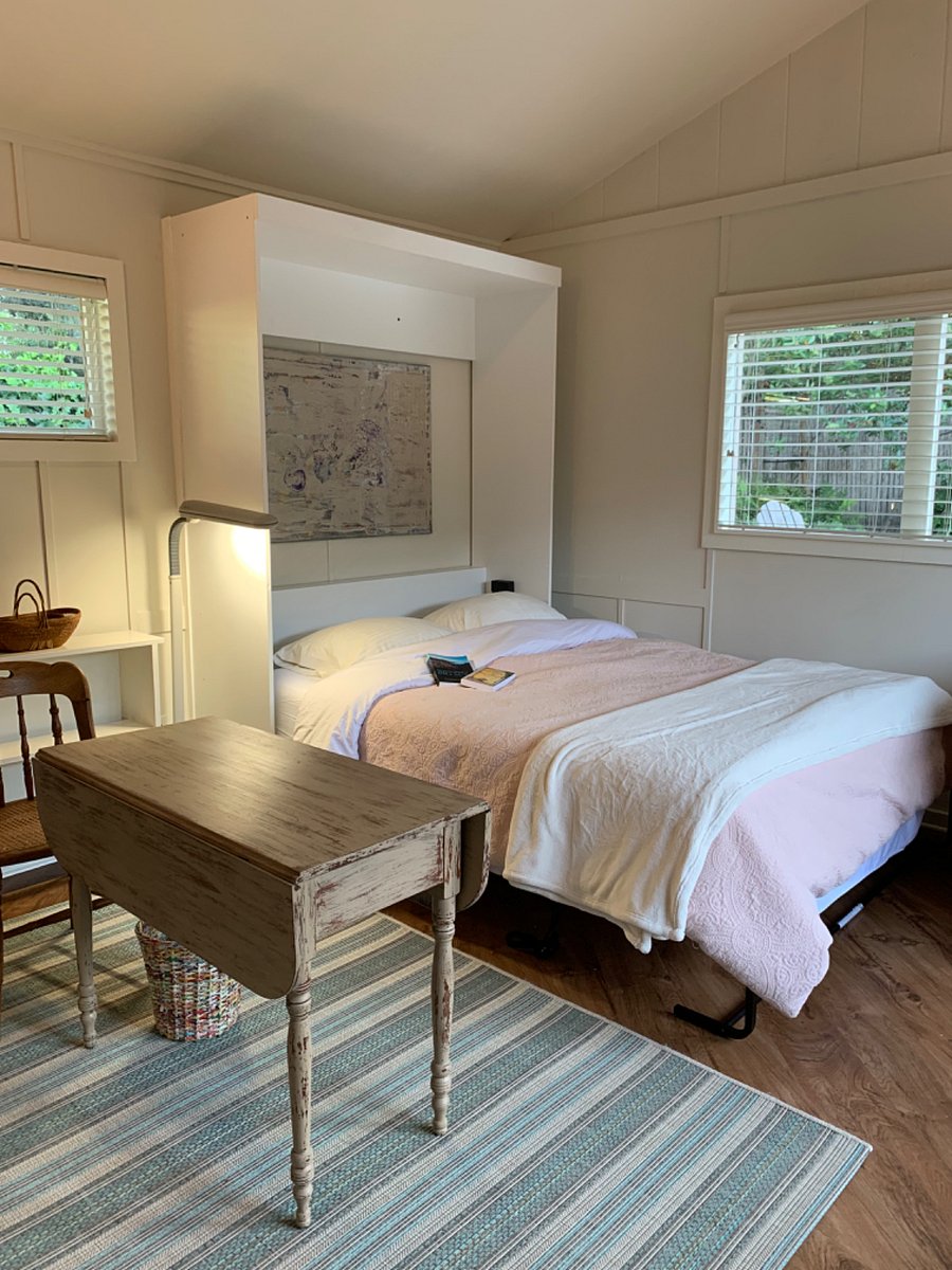 sleeping area with the bed pulled down. It is a true queen sized mattress. Good quality