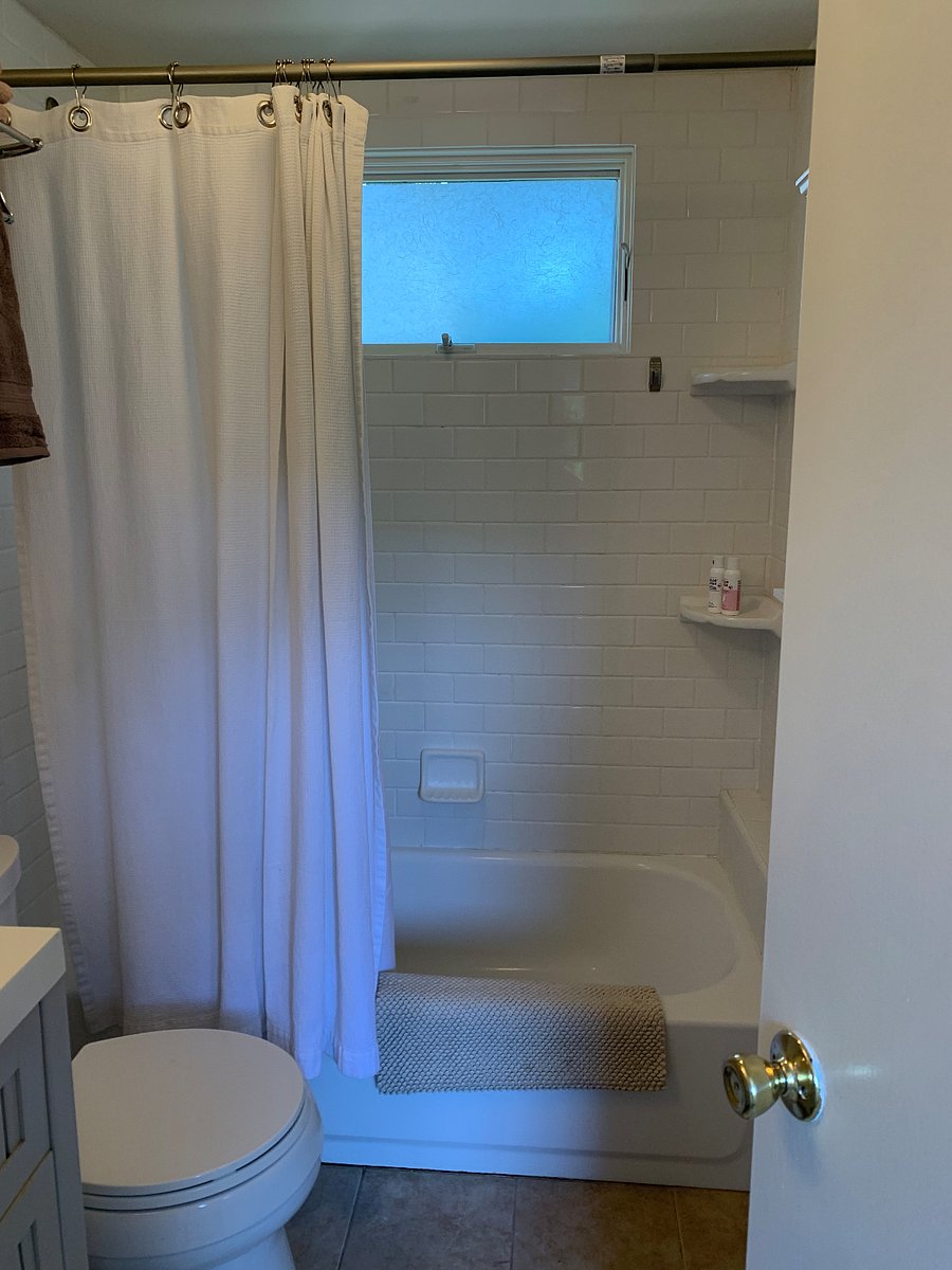 Full tub with shower