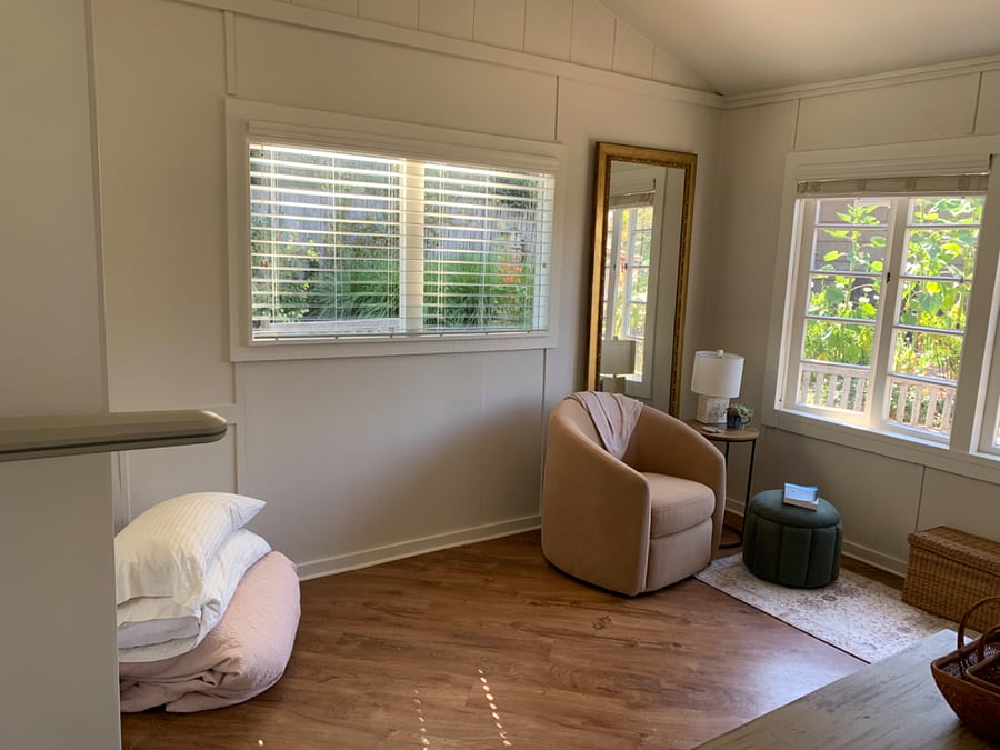 Studio area with the Murphy bed put up and away