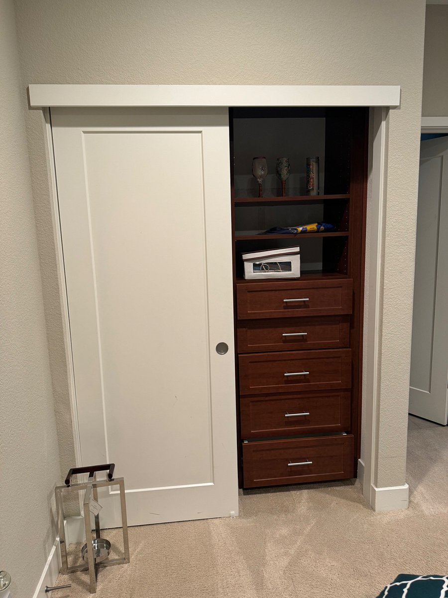 Closet with built-in dresser drawers