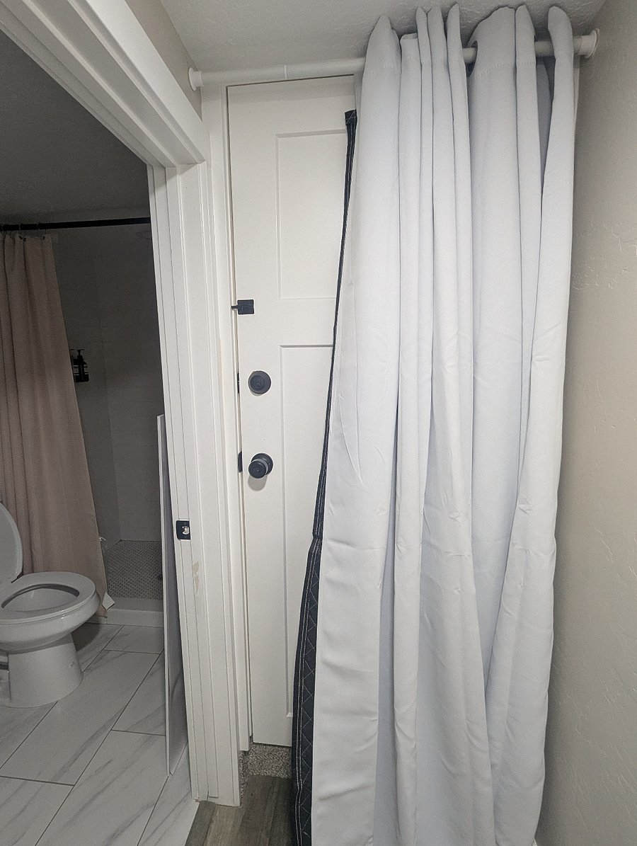 Door that leads to upstairs unit with lock on both sides.