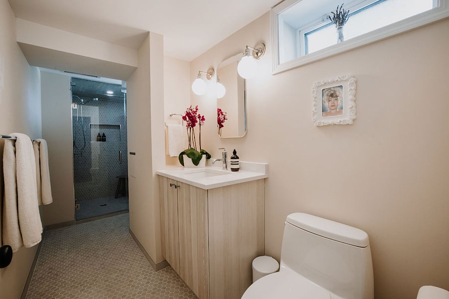 This gorgeous, huge  en suite steam shower  bathroom is designed with  your travel needs in mind. The heated floors make all the difference!