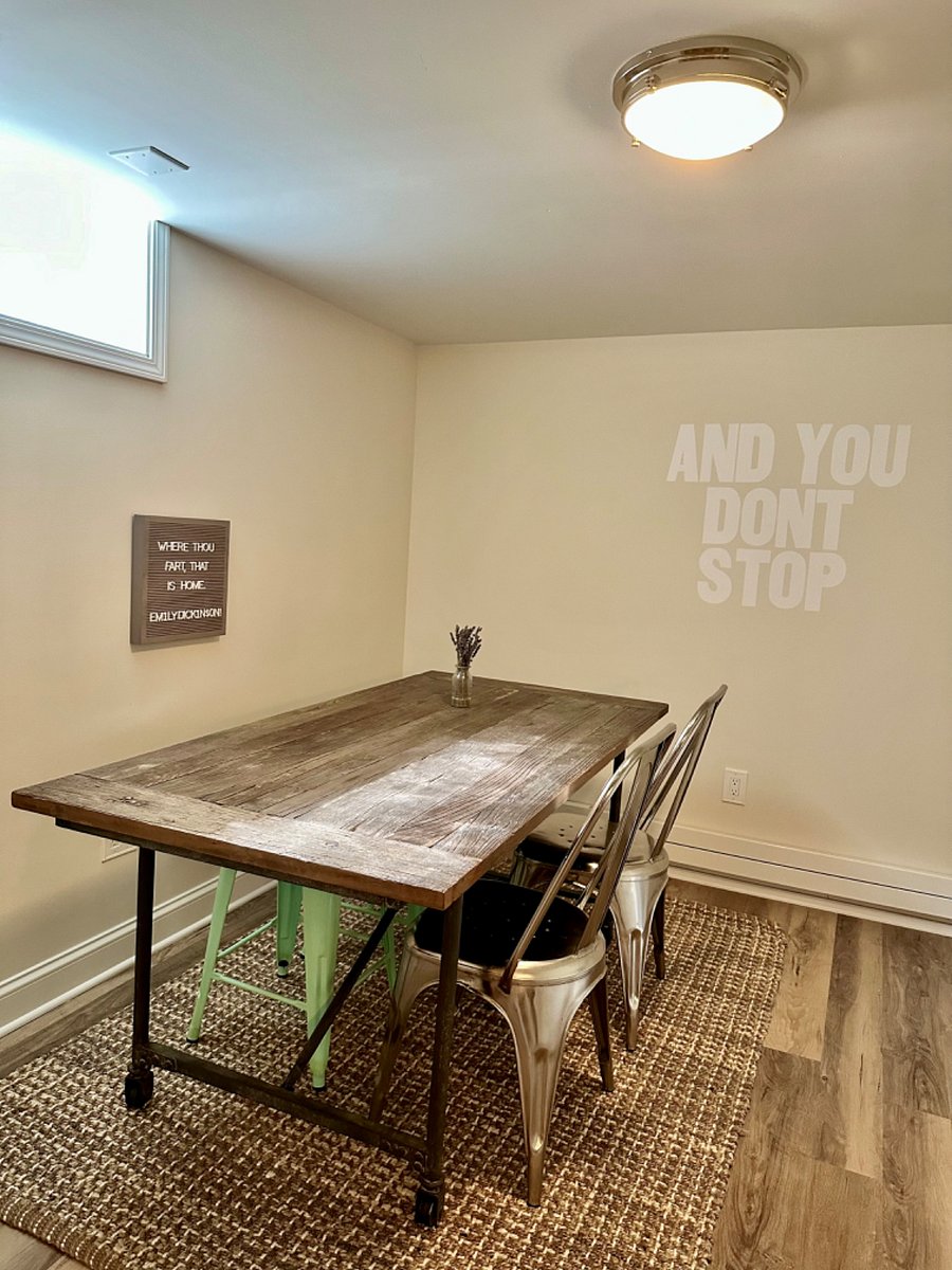 Dining room is just off the kitchenette and provides a lovely Restoration Hardware  table with seating for four. 