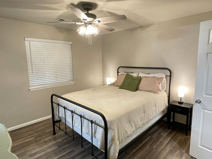 Master bedroom with queen bed and ensuite bathroom