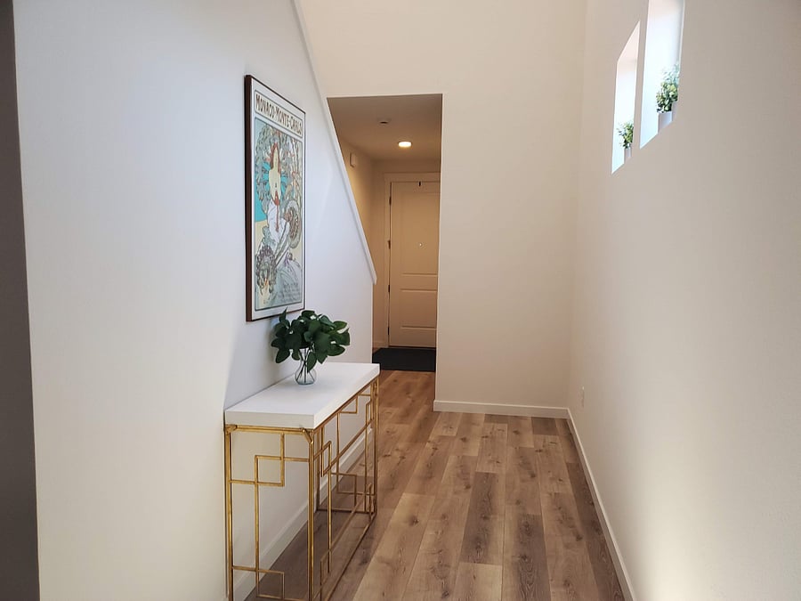 View of Entry and Front Door with Coat Closet and 1/2 Bathroom