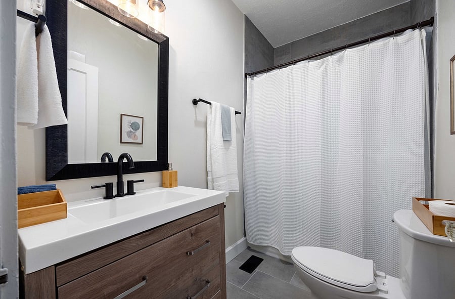 Brand new hall bath with plenty of storage