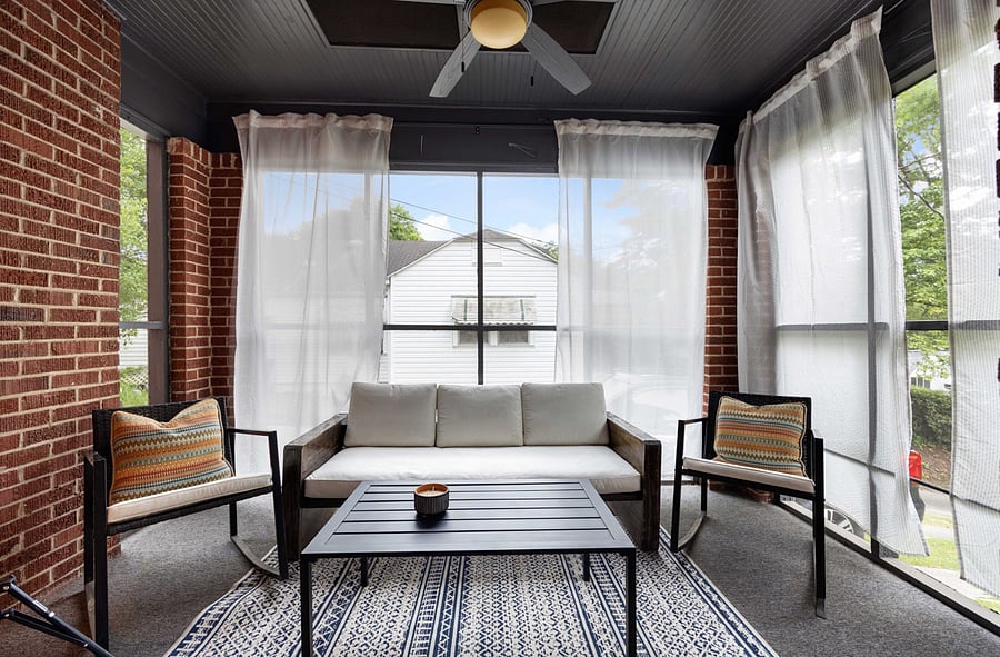Airy screened porch with ceiling fan
