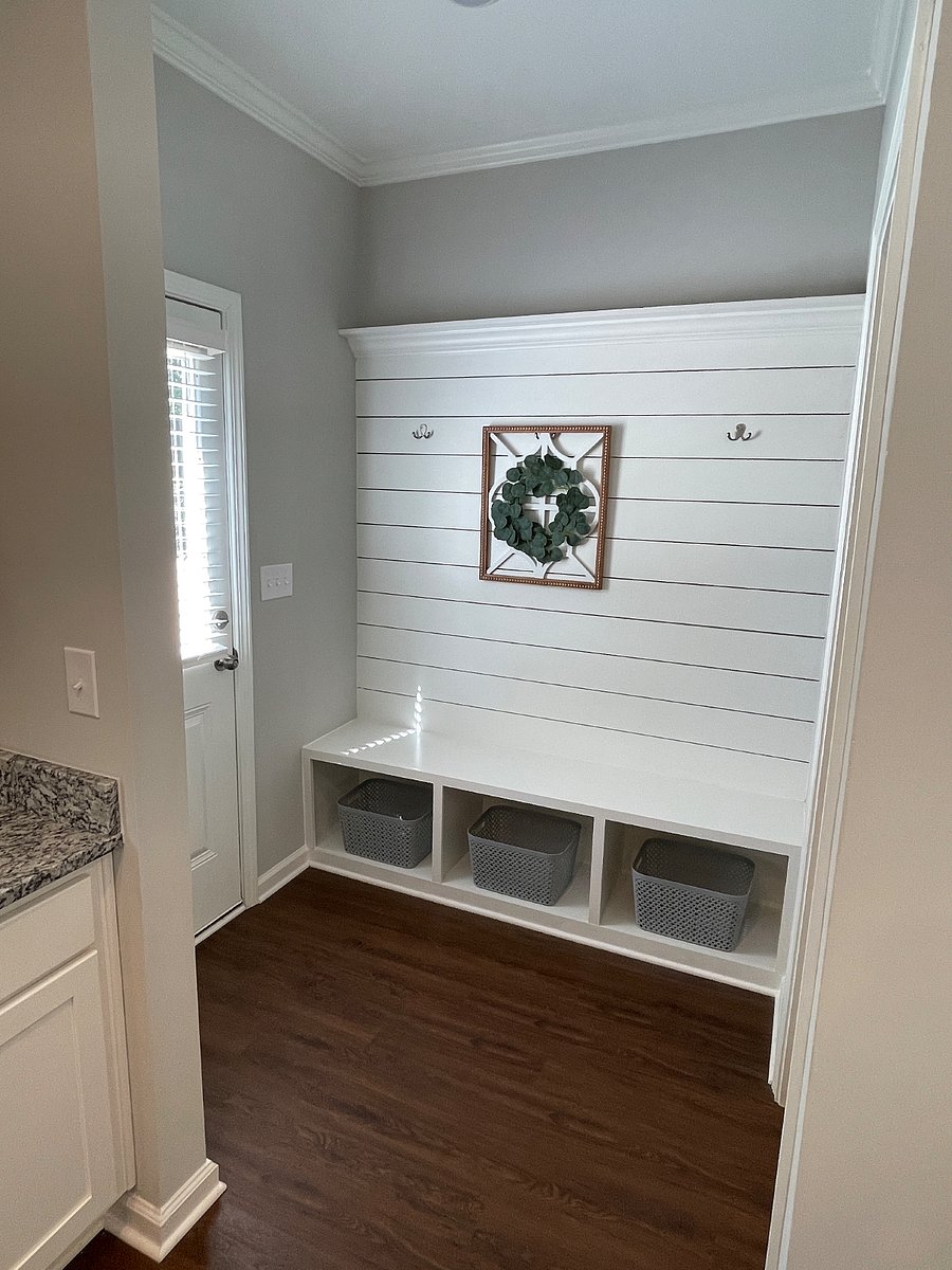 Mudroom with door to access the garage