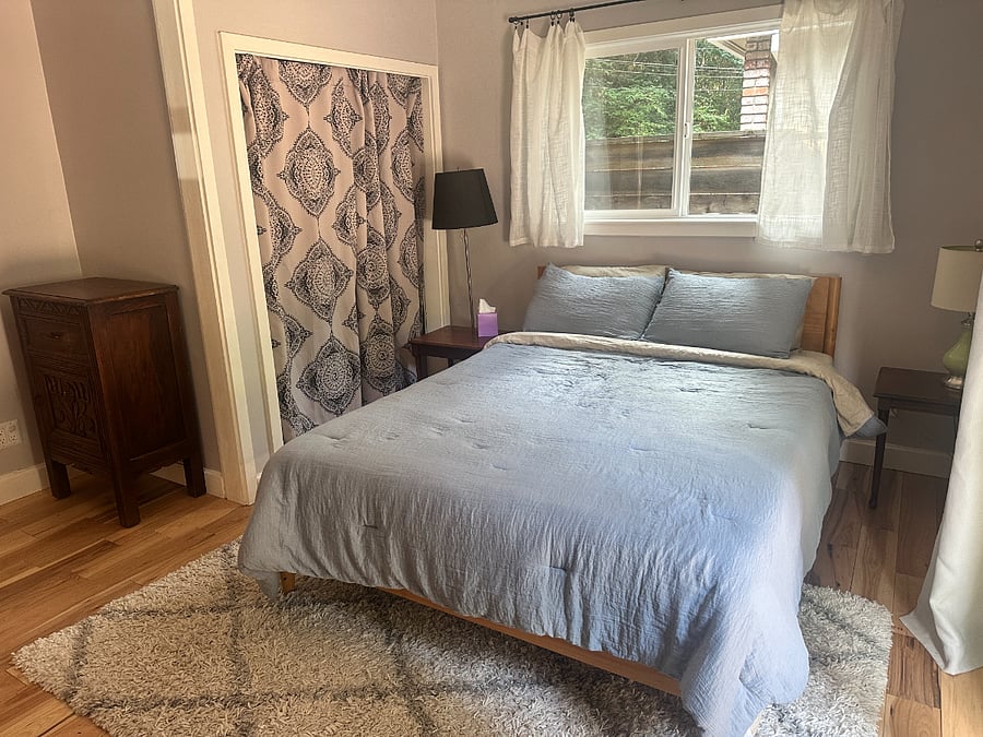 Bedroom 2 (of 4) with queen sized bed, large closet and access to back porch